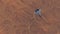 Tactical Jet Fighter Aircraft High Altitude Above Arid Mountain Desert with Sediment Mudflat