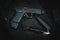 Tactical pistol g19 with muzzle compensator and extended magazine and weapon flashlight