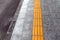 Tactile paving for blind handicap on tiles pathway.