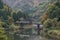 Tadami river with bridge and train