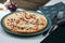 Taditional food `Tarte Flambee` or `Flammkuchen` from German-French Alsace border region