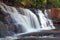 Tadtone waterfall in tropical rain forest