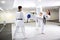 Taekwondo training with kick pad targets