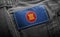 Tag on dark clothing in the form of the flag of the ASEAN