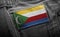 Tag on dark clothing in the form of the flag of the Comoros