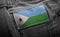 Tag on dark clothing in the form of the flag of the Djibouti