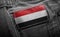 Tag on dark clothing in the form of the flag of the Yemen