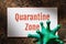 Tag with text and coronavirus, top view. Quarantine Zone Concept