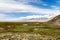 Tagharma viewing deck panorama on Pamir Plateau, at the feet of Muztagh Ata, China.