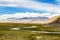 Tagharma viewing deck panorama on Pamir Plateau, at the feet of Muztagh Ata, China.