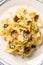 Tagliatelle pasta with black truffles and parmesan cheese