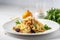 Tagliatelle pasta with bottarga and arugula. Italian Food