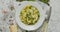 Tagliatelle pasta with creamy ricotta cheese sauce and asparagus served white ceramic plate