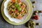 Tagliatelle pasta with tuna fish, tomato and olives