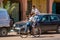 Tagounite, Morocco - October 10, 2013. Life on the street - three children riding on one bike