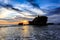 Tahah Lot Temple and ocean waves at sunset, Bali