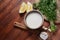 Tahini sauce made from sesame seeds in bowl with parsley