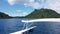 Tahiti Travel in French Polynesia in Outrigger boat in ocean lagoon on Huahine