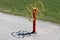 Tai chi spinner colorful red and yellow outdoor public park fitness exercise equipment with two large rotary wheels in public park