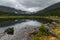 Taiga lake at a rainy day