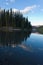 Taiga mirrored on Steward River near town of Mayo