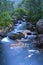 Taiga. Siberia. Mountain stream. Parking near Parabola. Photograph with long shutter speed.