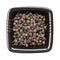 Tailed pepper cubeb in black bowl isolated