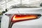 Taillight, headlight of modern prestigious luxurious car. Closeup, macro view of LED xenon car`s headlamp, lamp headlight