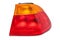 A taillight of a stop signal for a German auto - optical equipment of white and red color on a white isolated background. A spare