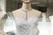 Tailor\\\'s textile female mannequin with black lines covered with canvas fabric pattern and draping for dressmakers working.