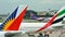Tails of Thai Airways Airbus 340-600, Emirates Boeing 777-300ER and Philippines Airlines Airbus 330