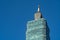 Taipei 101 skyscraper building close up view over dark blue sky