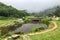 Taipei, Taiwan - May 2018: Hikers resting on top of mountain in Yangmingshan National Park in Taipei, Taiwan