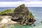 Taitomo Island huge rock view, Auckland west coast, New Zealand