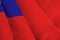 Taiwan flag with big folds waving close up under the studio light indoors. The official symbols and colors in banner