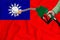 TAIWAN flag Close-up shot on waving background texture with Fuel pump nozzle in hand. The concept of design solutions. 3d