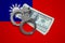 Taiwan flag with handcuffs and a bundle of dollars. Currency corruption in the country. Financial crimes