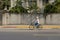 Taiwan, July 01, 2018:  A Taiwanese woman is riding a bike in Taipei, Taiwan