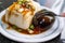 Taiwan`s distinctive famous snacks: thousand-year-old eggs tofupidan tofu in a white plate on stone table, Taiwan Delicacies