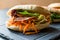 Taiwan`s Pita Bread Bun Sandwich Gua Bao with Smoked Bacon, Carrot Slices and Greens from Asia.