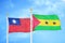 Taiwan and Sao Tome and Principe two flags on flagpoles and blue sky