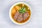 Taiwanese beef noodle soup is a noodle soup dish originating from Taiwan.  top view