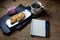 Taiyaki cakes, coffee,notebook on wood background