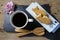 Taiyaki cakes with coffee on wood background