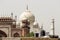 Taj Mahal Agra, India. Mogul marble mausoleum with minarets, mosque