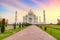 Taj Mahal Agra with moody sunrise sky. A UNESCO World Heritage site at Agra India