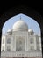 Taj Mahal from an arched portal of adjacent mosque