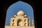 Taj Mahal framed wthin an Arch, Blue sky, India