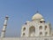 Taj Mahal mausoleum and symbol of love, white ivory marble on the South Bank of the Yamuna river in the Indian city of