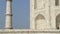 Taj Mahal\'s side wall and tower, closeup.